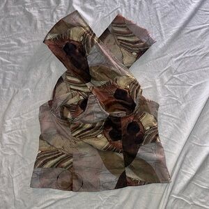 Pretty little thing 
Cross shoulder top